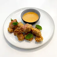 Country-Fried Strip Steak Bites with Hot Sauce White Gravy